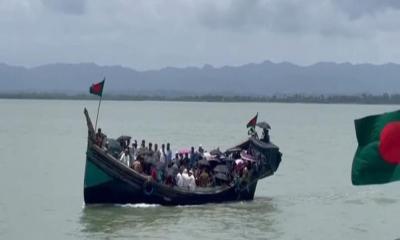 সেন্টমার্টিনে যাত্রীবাহী ট্রলারে শতাধিক গুলি